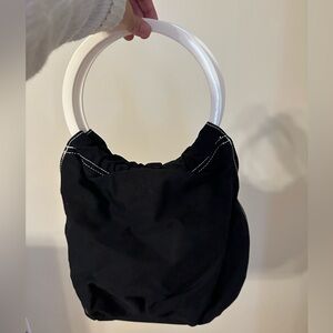 Black bucket hobo bag with top handles